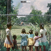 the album cover for Mavis Staples - We Get By [LP]