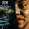 the album cover for Nikki Giovanni - Like A Ripple On A Pond (Blue) [Clear Vinyl]