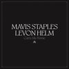the album cover for Mavis Staples & Levon Helm - Carry Me Home [Indie Exclusive Limited Edition Translucent Clear 2LP]