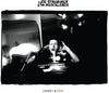 the album cover for Joe Strummer & The Mescaleros - Joe Strummer 002: The Mescaleros Years [7LP / 32-Page Book]