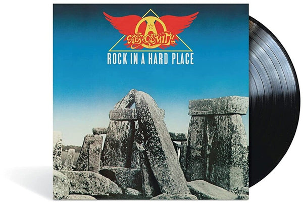 the album cover for Aerosmith - Rock In A Hard Place [LP]