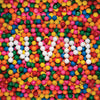 the album cover for Tacocat - Nvm - Gold [Colored Vinyl] (Gol) [Limited Edition] (Aniv) [Reissue]