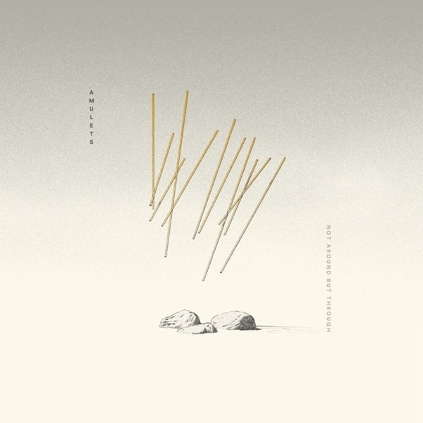 the album cover for Amulets - Not Around But Through