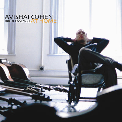 the album cover for Avishai Cohen/ Guiliana,Mark / Tzur,Tomer - At Home
