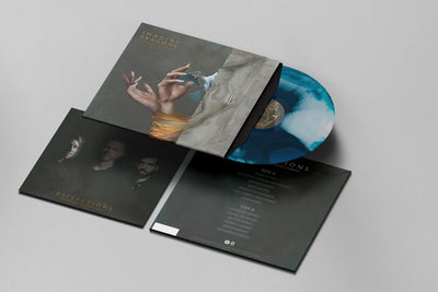 the album cover for Imagine Dragons - Reflections (from the Vault of Smoke + Mirrors) -[Ocean Blue LP]