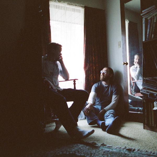 the album cover for Whitney - Small Talk [Indie Exclusive Bone Color LP]