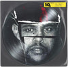 the album cover for The Weeknd - Can't Feel My Face / Earned It [Picture Disc 7" Single]
