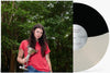 the album cover for Eliza Mclamb - Good Story [Bone/Black LP]