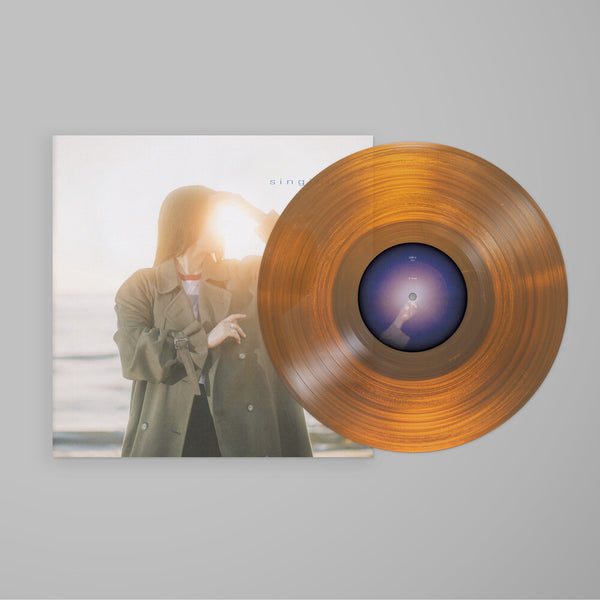 the album cover for Gia Margaret - Singing [Sunshine]