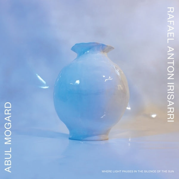 the album cover for Abul Mogard  / Rafael Anton Irisarri - Where Light Pauses In The Silence Of The Sun