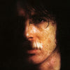 the album cover for Charly Garcia - Yendo De La Cama Al Living